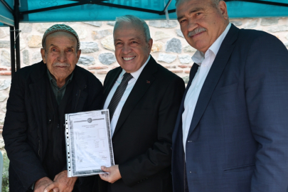 Bursa Ürünlü'de 275 hak sahibine imarlı tapu sevinci